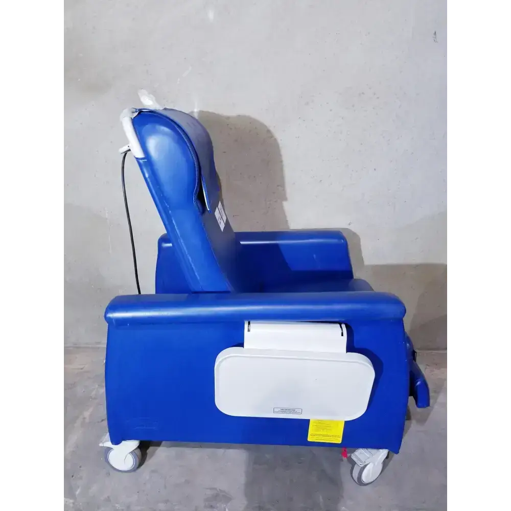 Blue Winco 694 care recliner dialysis chair with white accents, casters, back massager, and side trays for patient comfort