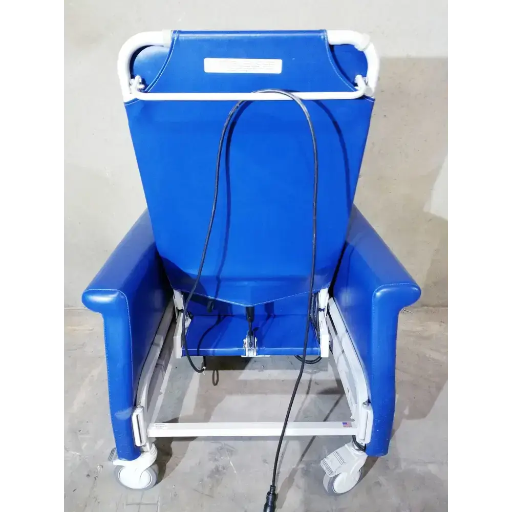 Blue upholstered care recliner dialysis chair with white metal frame casters back massager and side trays by Winco 694