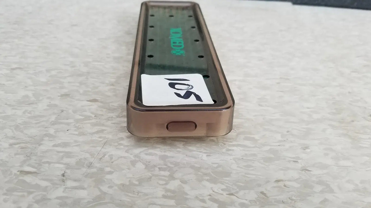 Back side of a rose gold rectangular xomed poly vac medical equipment sterilization case with transparent panel and bonk branding