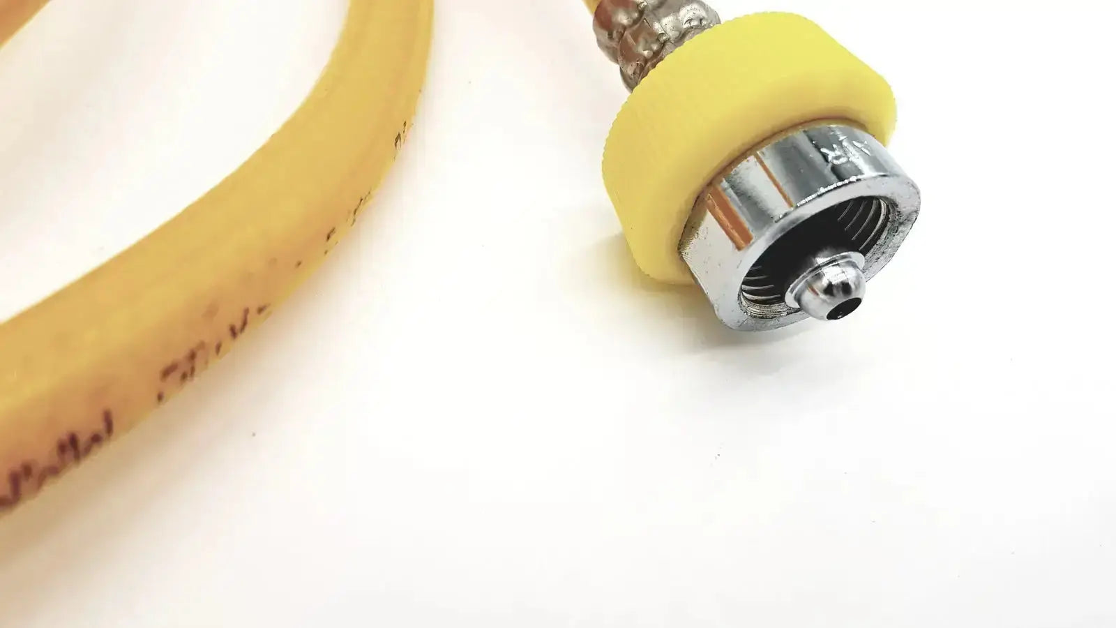 Yellow hose air print lot 08-12 featuring a rubber gas hose with chrome metal connector and yellow foam grip