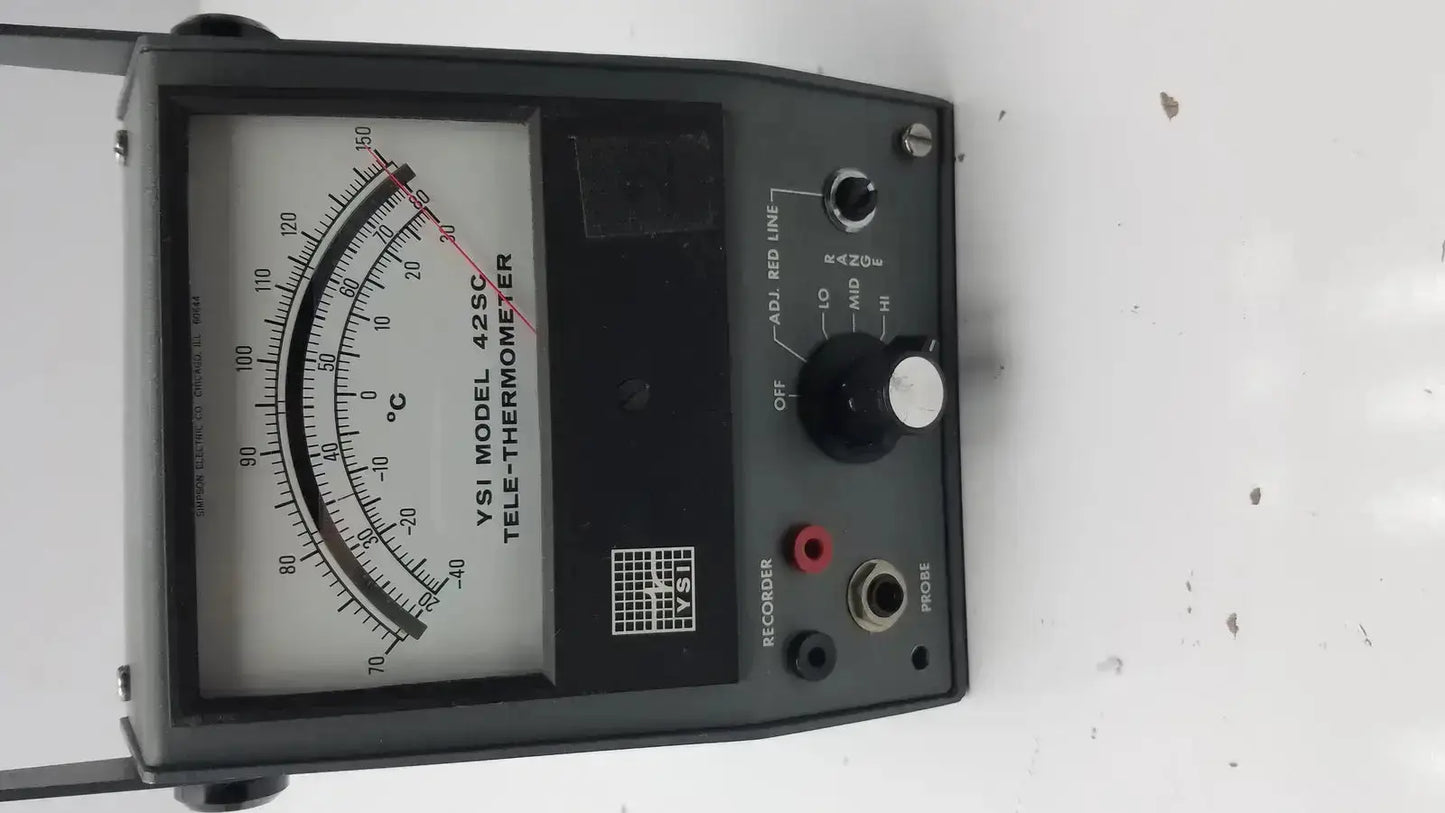 Black YSI model 42SC tele-thermometer with analog dial and multiple measurement scales for precise temperature readings