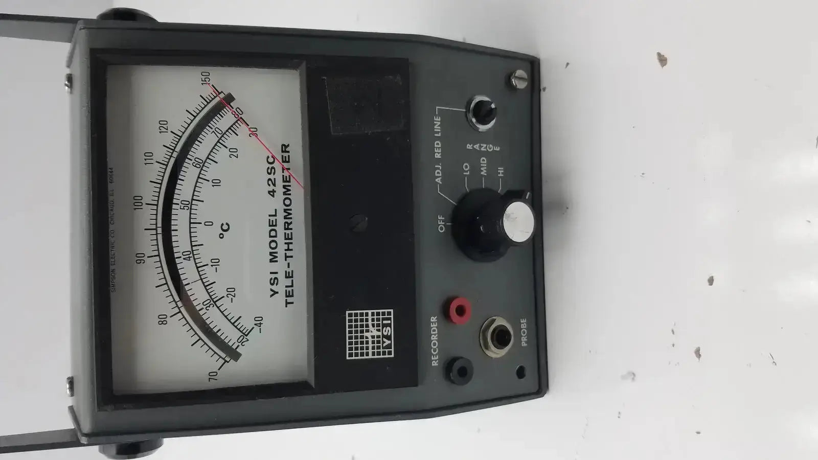 Black YSI model 42SC tele-thermometer with analog dial and multiple measurement scales for precise temperature readings