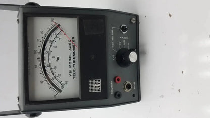 Black YSI model 42SC tele-thermometer with analog dial and multiple measurement scales for precise temperature readings