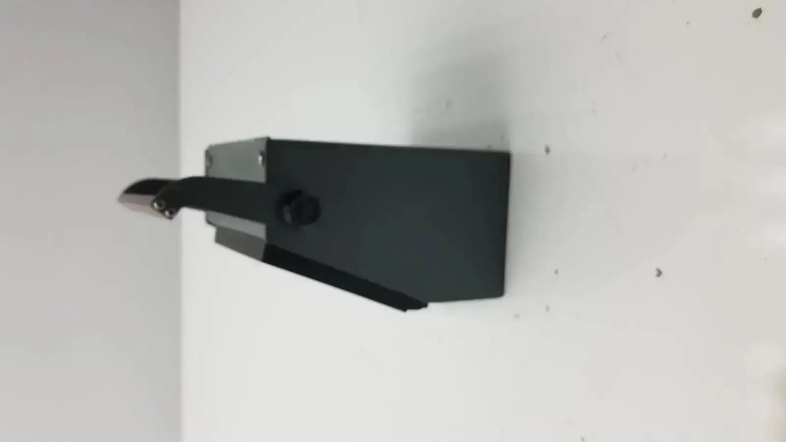 Black rectangular wall-mounted ysi model 42sc tele-thermometer with metallic handle and visible screw detail