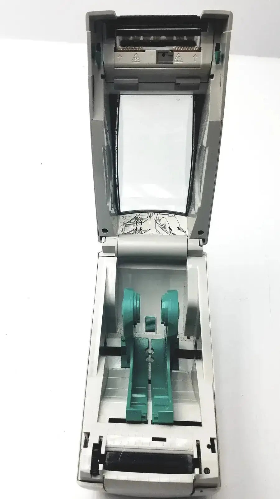 Gray zebra lp2824 thermal label printer showing teal internal components and paper roll compartment untested model