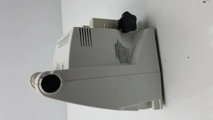 Gray plastic zimmer hall ats 3000 automatic tourniquet system control unit with black knob and ventilation slits