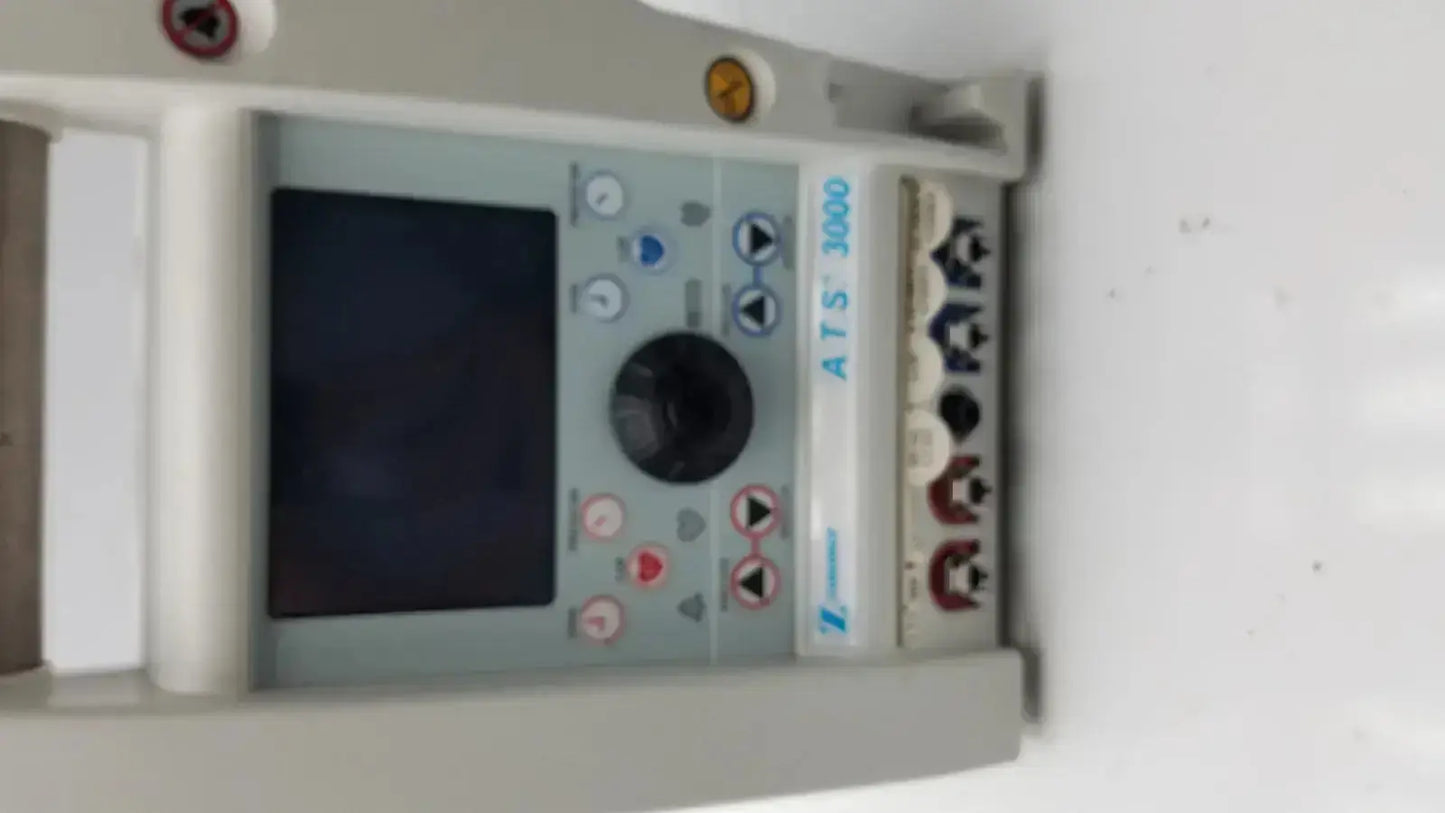 Gray zimmer hall ats 3000 automatic tourniquet switchgear panel with central black rotary dial and colored pushbuttons