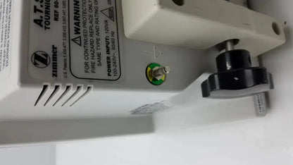 White plastic power supply unit with black rotary knob and green grounding screw for zimmer hall ats 3000 automatic tourniquet