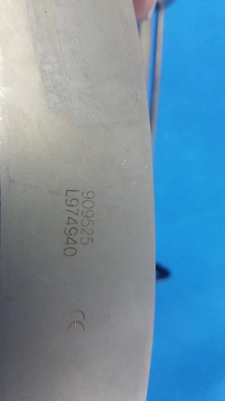 Silver-colored metal kitchen knife with engraved serial numbers and ce mark for biomet finneli tensioning medical equipment reuse