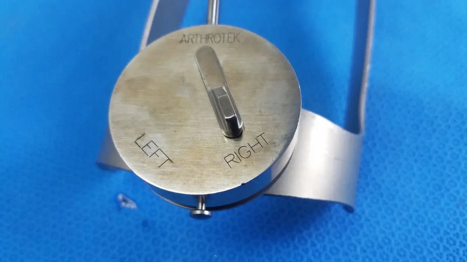 Silver metallic arthrotek knee joint alignment device with left and right markings for reuse medical equipment biomet finneli tensioning